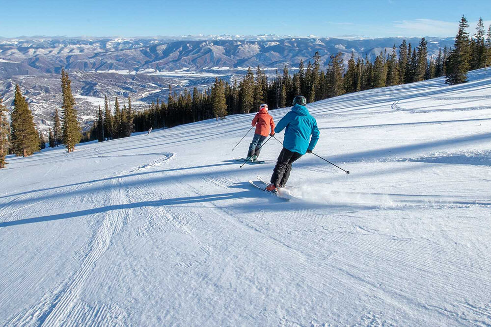 Snowmass Mountain, personas esquiando